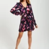Liquorish Abstract Ikat Print Mini Wrap Dress In Black